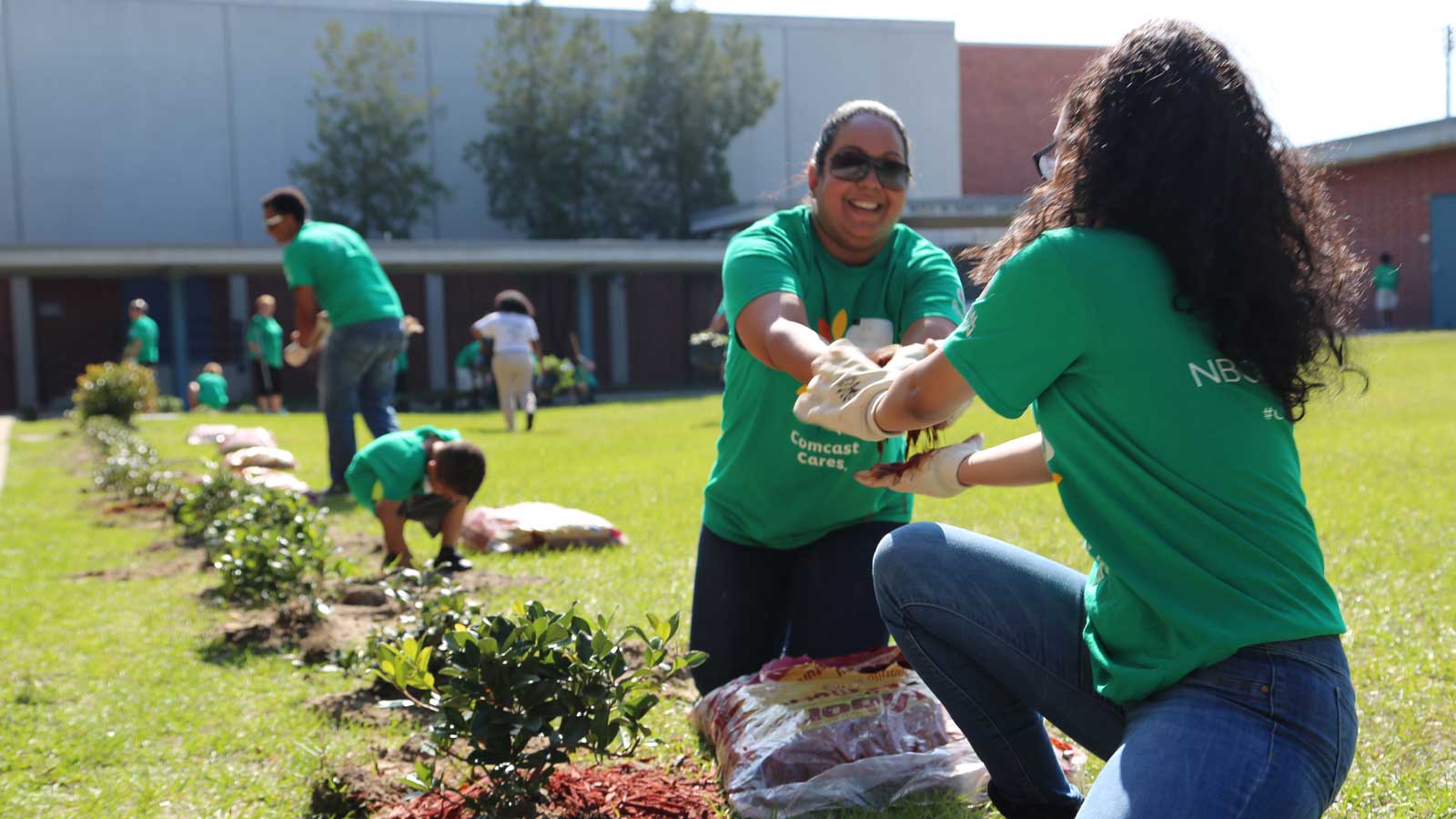 Comcast Cares Day volunteers in garden