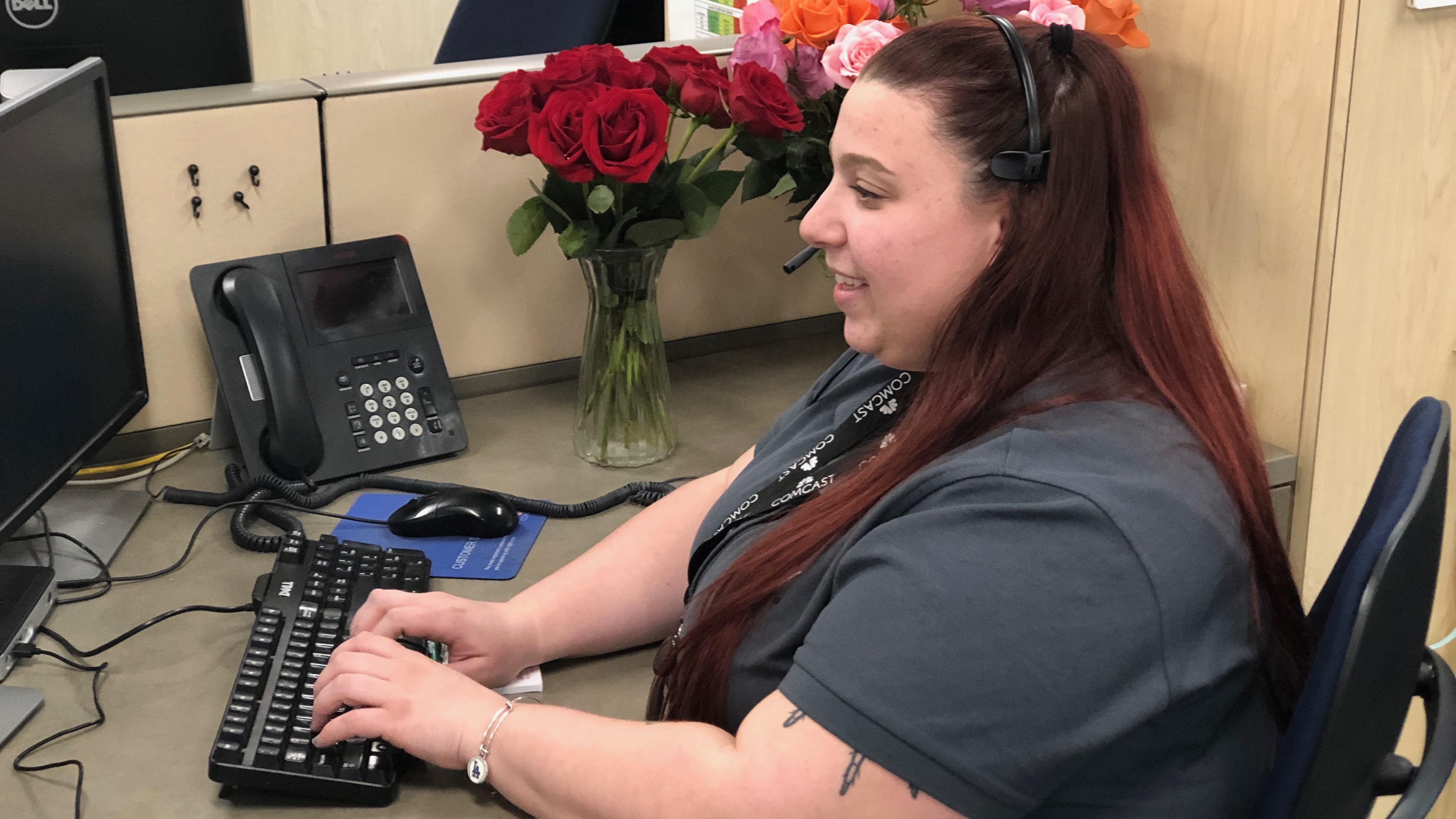 woman typing on a computer