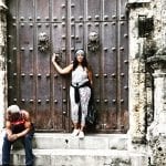 Dana Brooks in front of ancient door