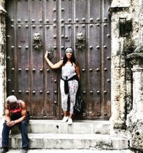 Dana Brooks in front of ancient door