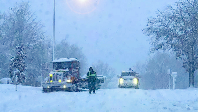 Xfinity trucks in winter storm