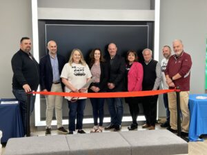 Employees and guests at ribbon cutting in York Xfinity Store